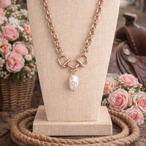 Chunky gold chain with horse bit and drop pearl